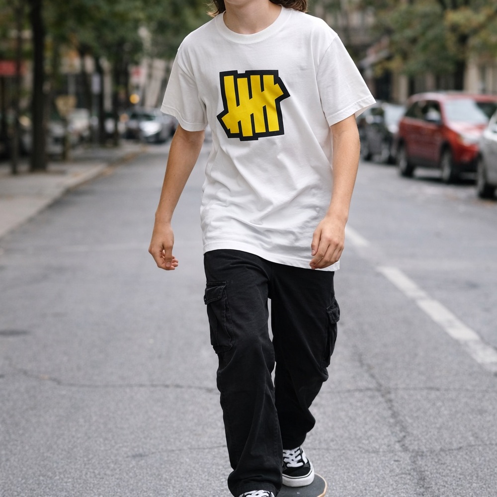 Undefeated White Tee with Yellow and Black Graphic FINAL
